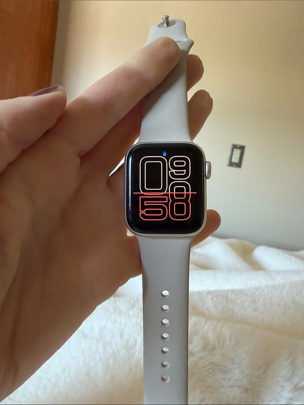 Apple Watch with Silver Case and Pink Sand Band